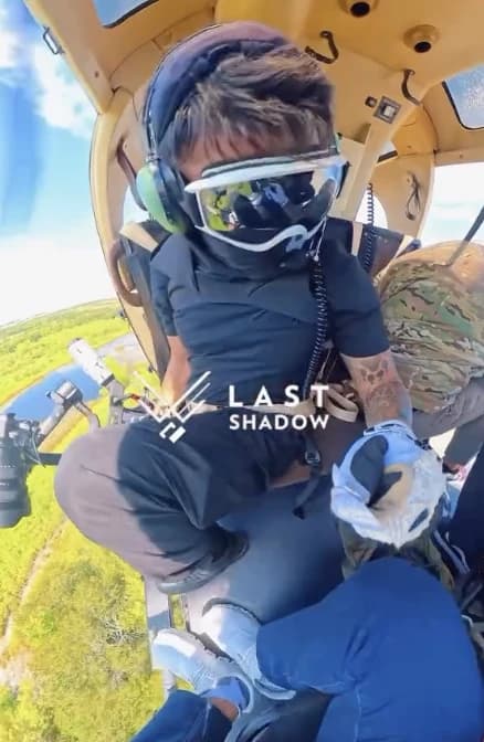 Door off, gimbal out — air-to-air over the Hill Country